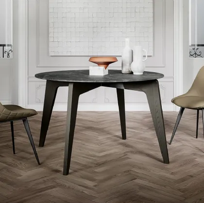 Tavolo rotondo Magic con top in laminato e gambe in massello di Frassino verniciato di Arredo3