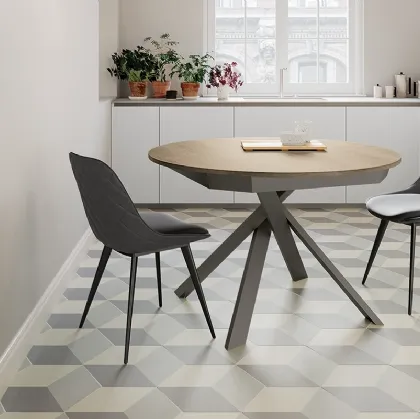 Tavolo rotondo allungabile Twist con top in laminato e gambe in metallo verniciato di Arredo3